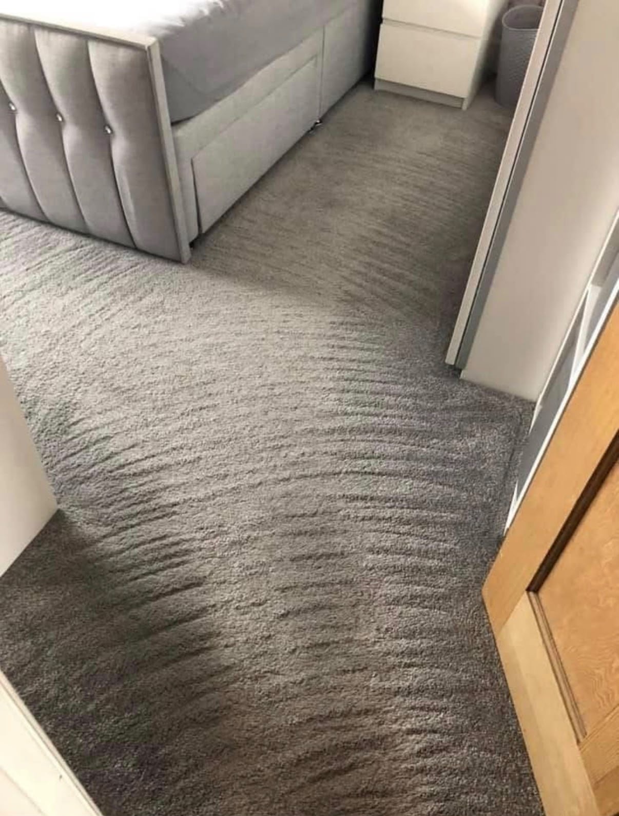 Fresh clean carpet in bedroom